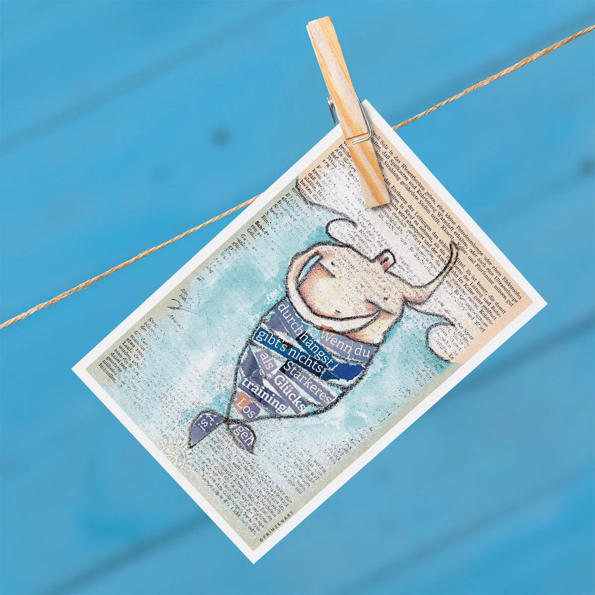 Wal mit Spruch Glückstraining, Mixed-Media-Illustration auf Buchseite | Prinzenart
