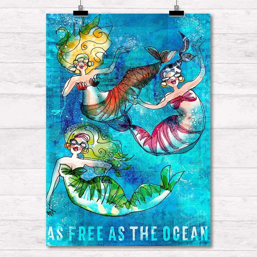 Drei bunte Meerjungfrauen schwimmen frei im tuerkisen Ozean, Text As Free As The Ocean | Prinzenart